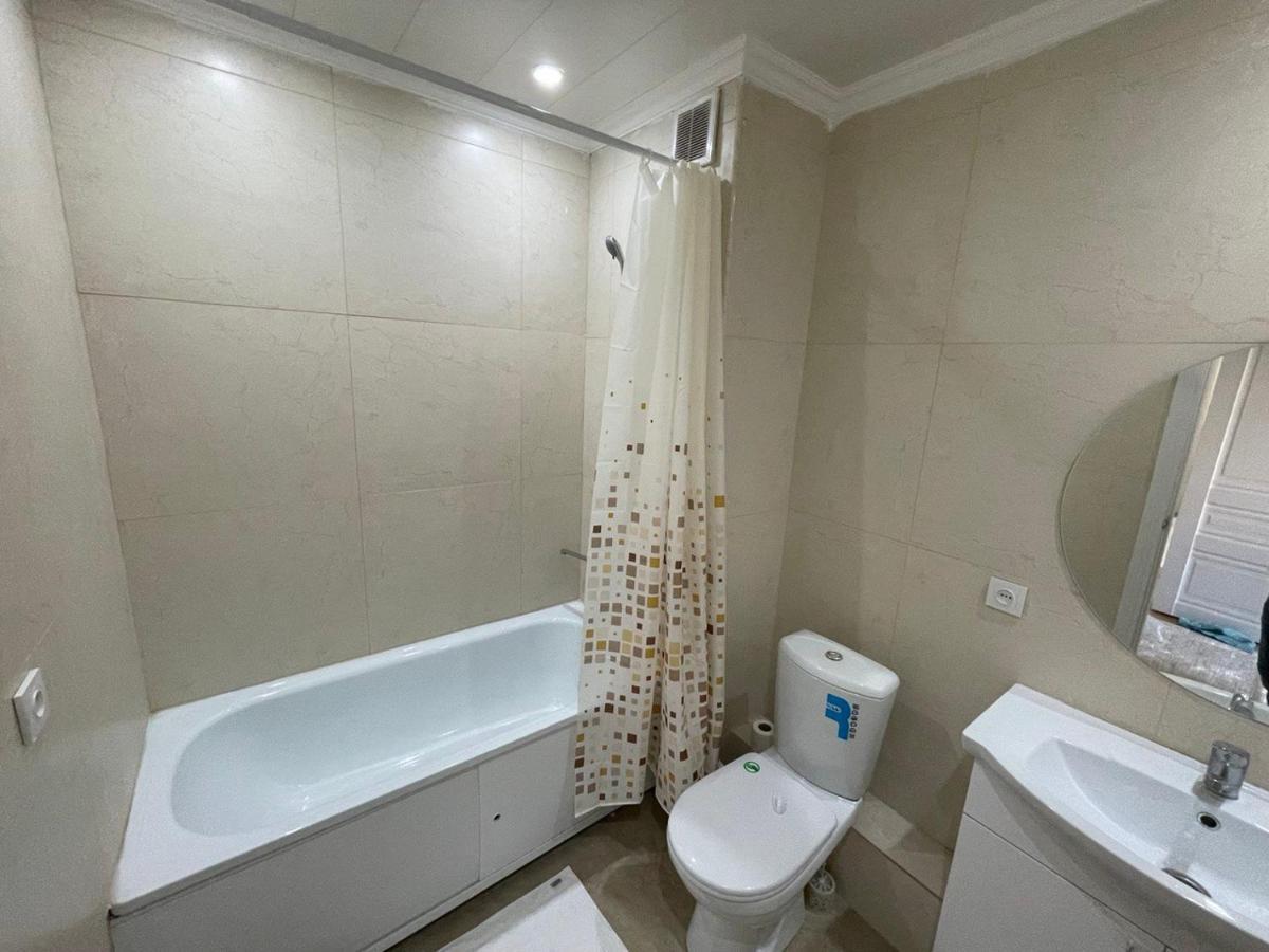 Apartment In Almaty Esterno foto