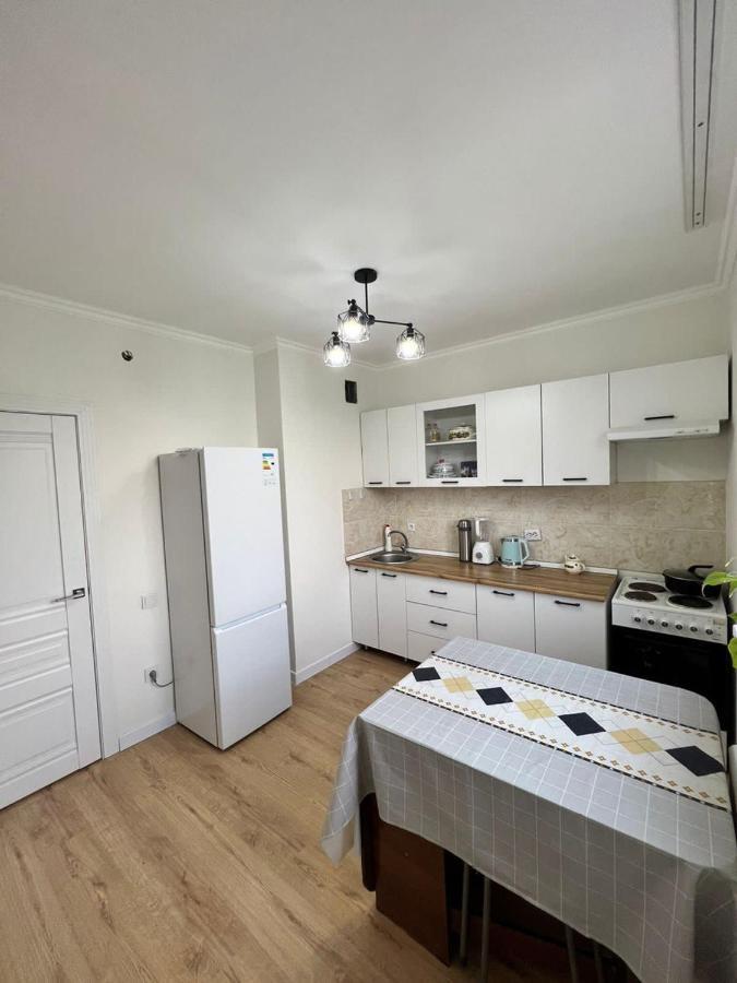 Apartment In Almaty Esterno foto