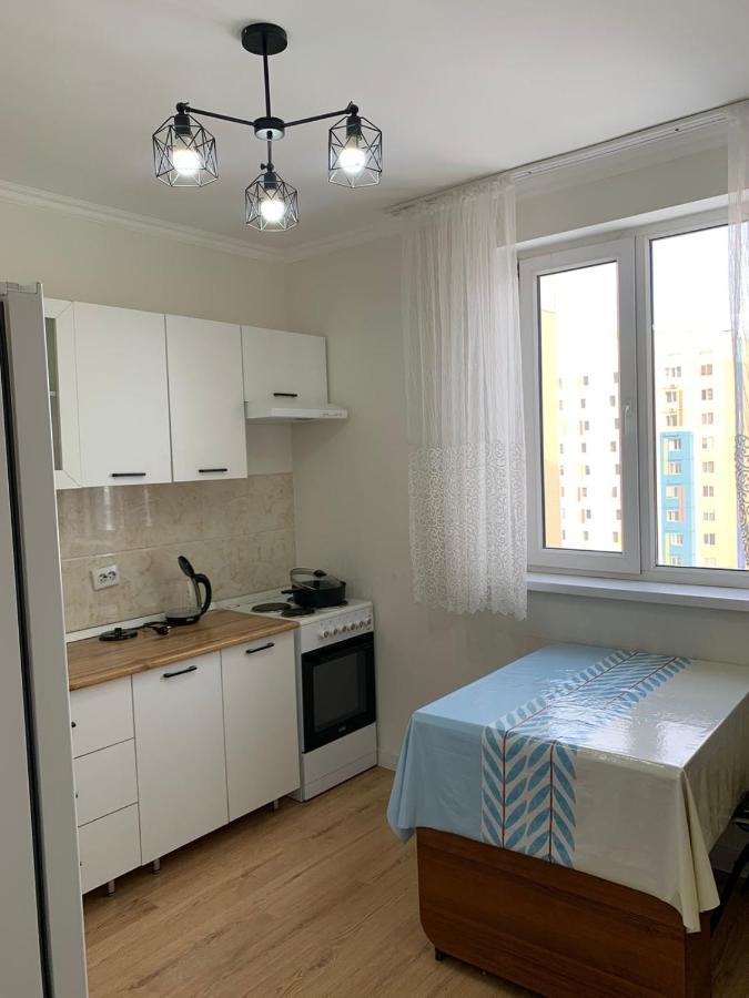 Apartment In Almaty Esterno foto